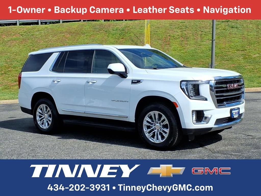 2024 GMC Yukon SLT in Summit White — front three-quarter view