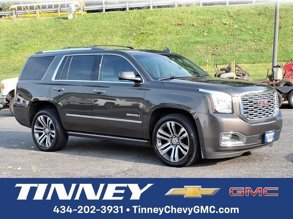 2020 GMC Yukon Denali in Smokey Quartz Metallic — front three-quarter view