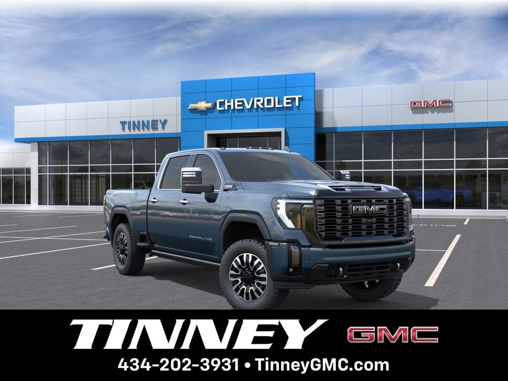 2026 GMC Sierra 2500 HD Denali Ultimate in Downpour Metallic — front three-quarter view