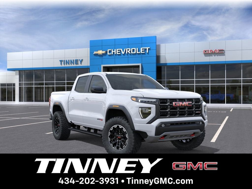 2026 GMC Canyon AT4 in Summit White — front three-quarter view
