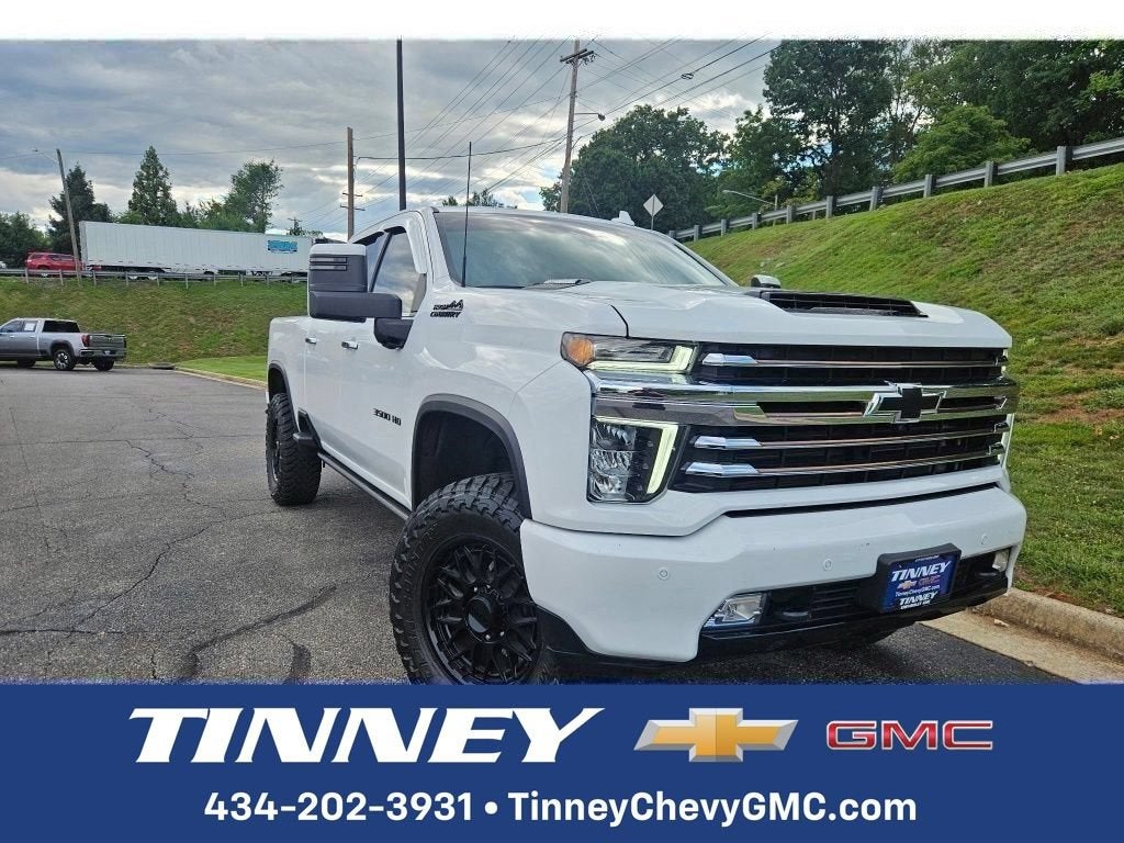 2023 Chevrolet Silverado 3500 HD High Country in Summit White — front three-quarter view