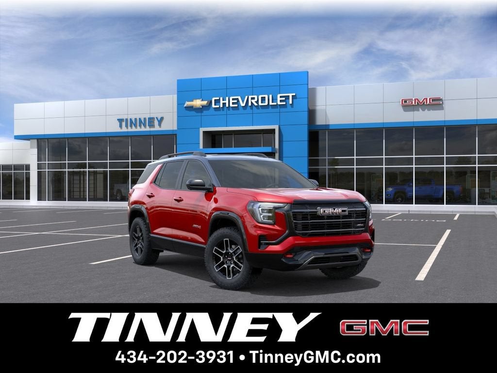 2026 GMC Terrain AT4 in Volcanic Red Tintcoat — front three-quarter view
