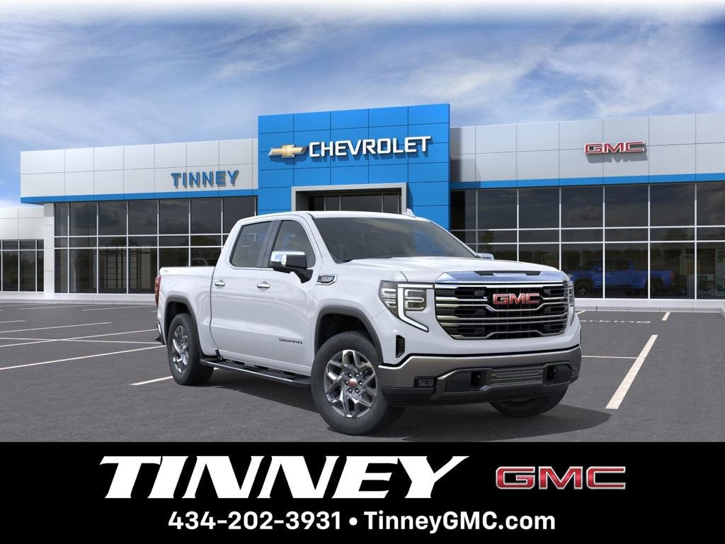 2026 GMC Sierra 1500 SLT in Summit White — front three-quarter view